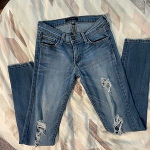 Light color distressed Flying Monkey jeans.